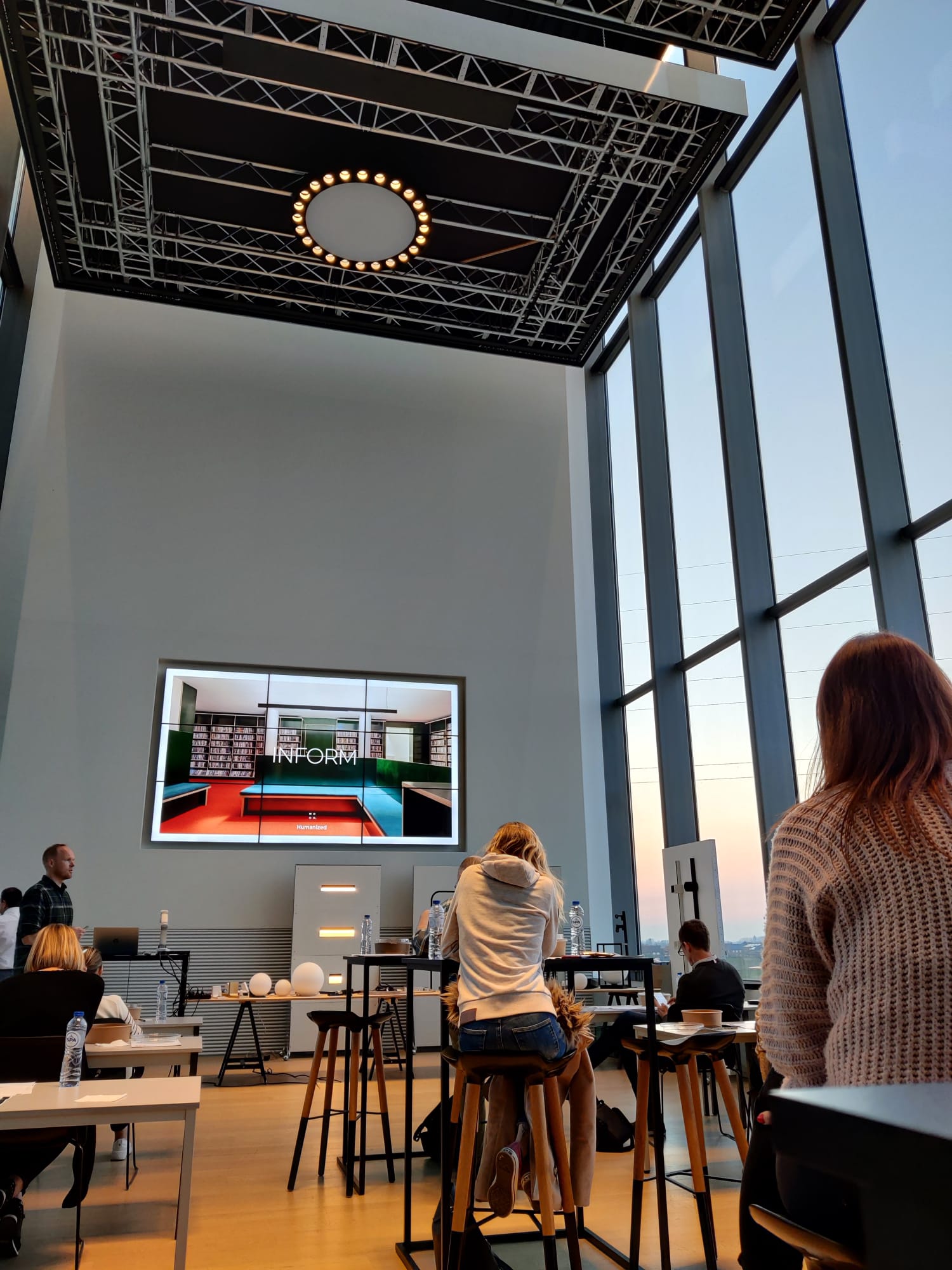 Employees from Delta Light in a meeting room