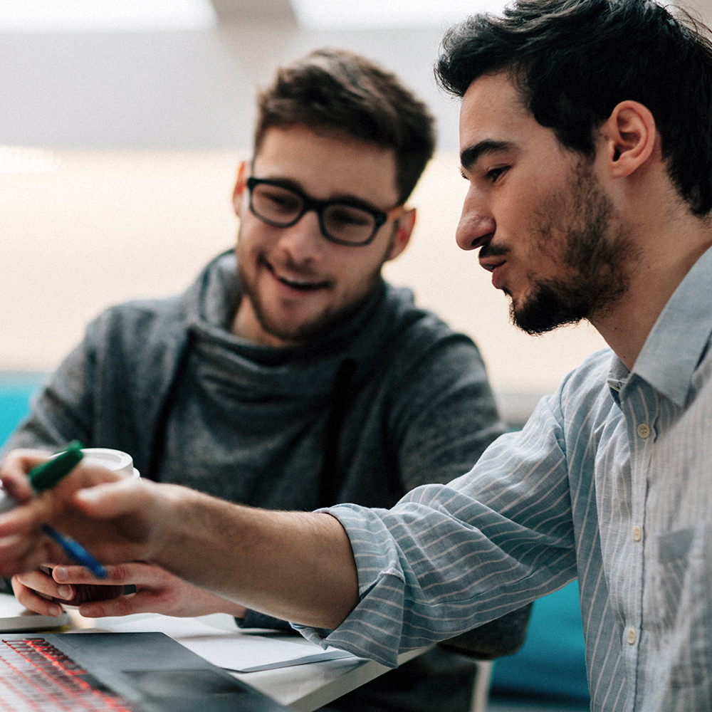 Two people working collaborating