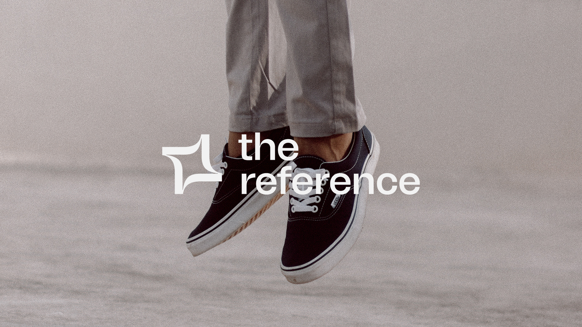 Jumping person with The Reference logo