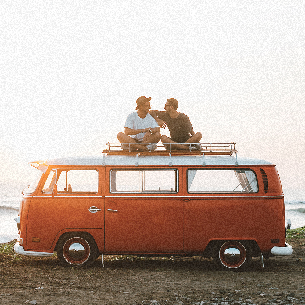 Guys sitting on VW van