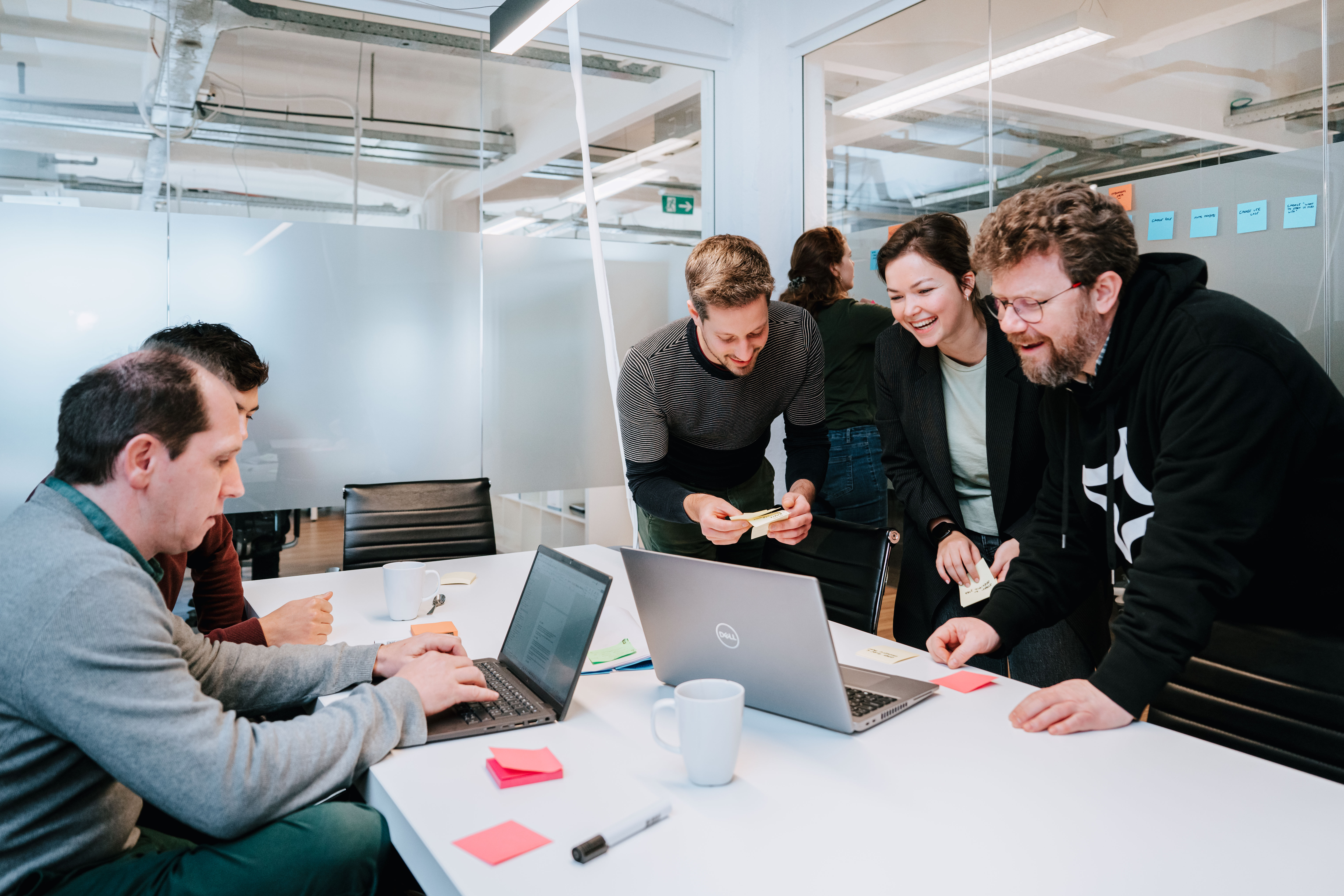 A team of colleagues having fun during a workshop
