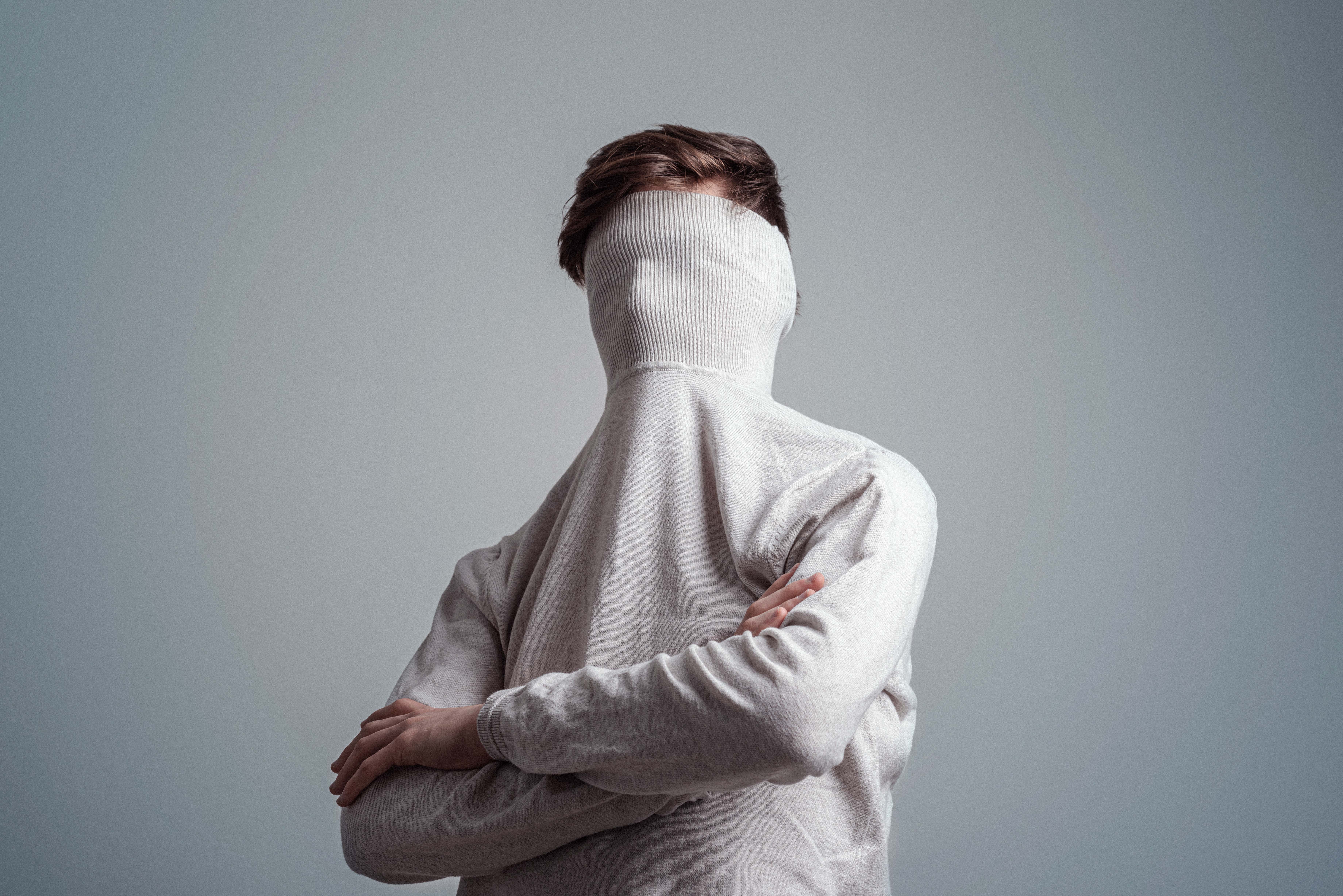 Person hiding in shirt