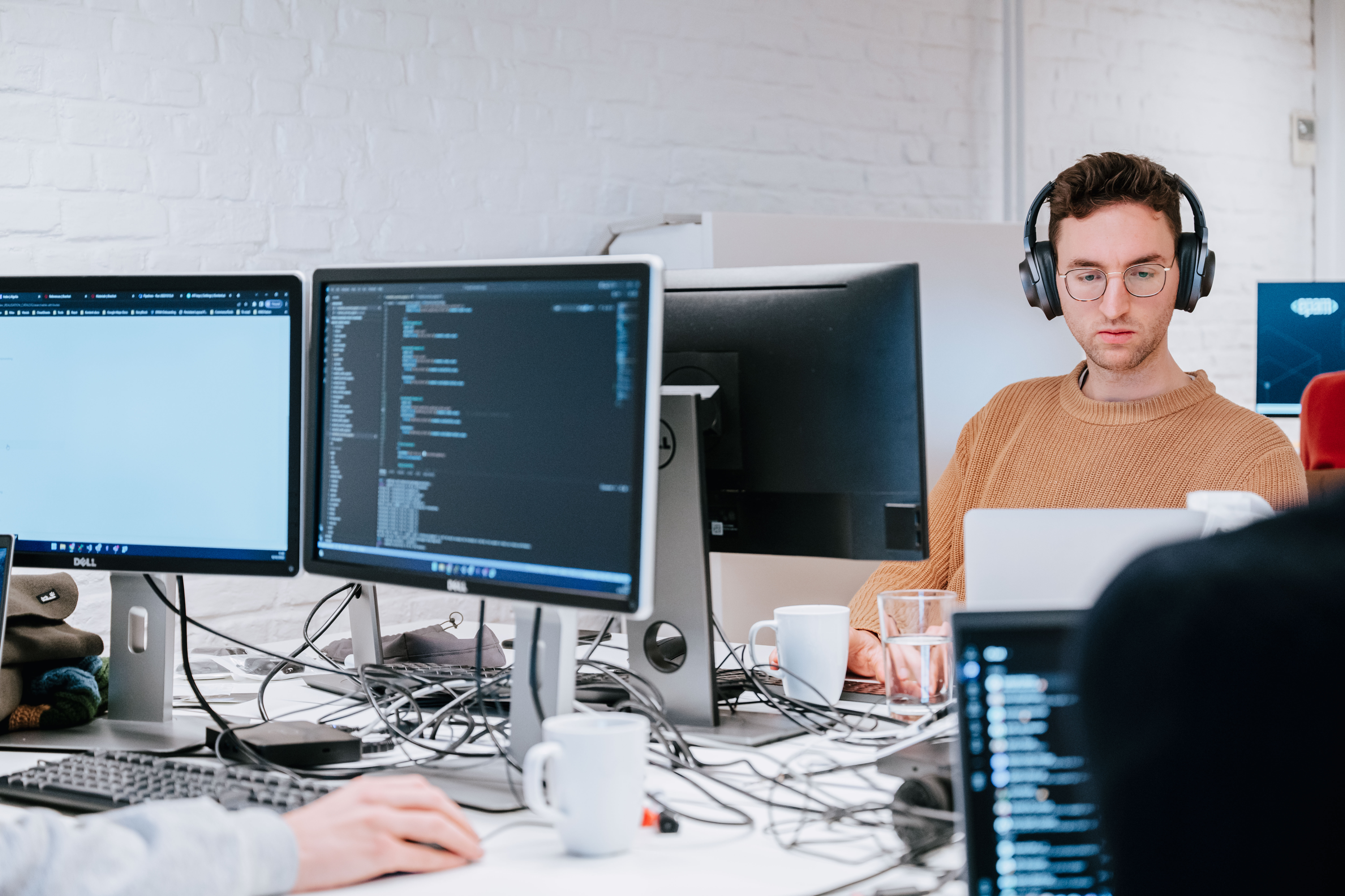 Person working focused on his laptop 